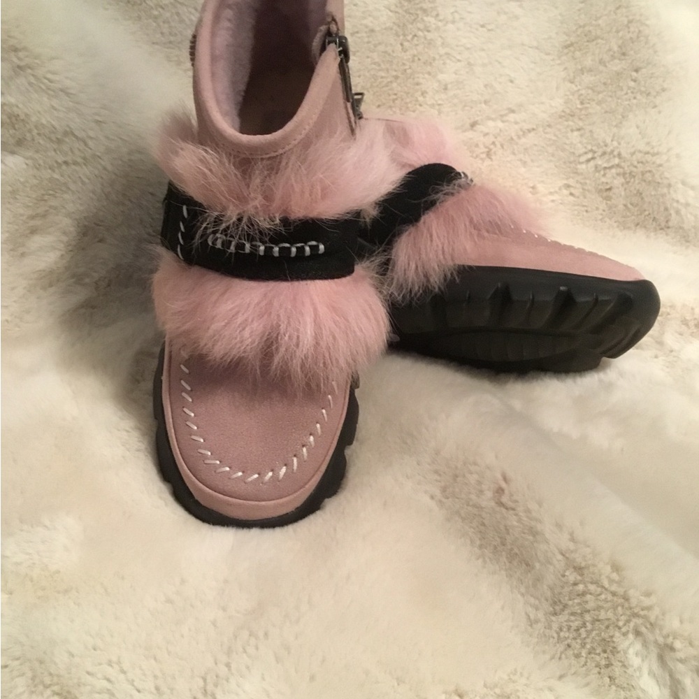 New pink UGG size 6 fits me and I wear size 7 . Adorable